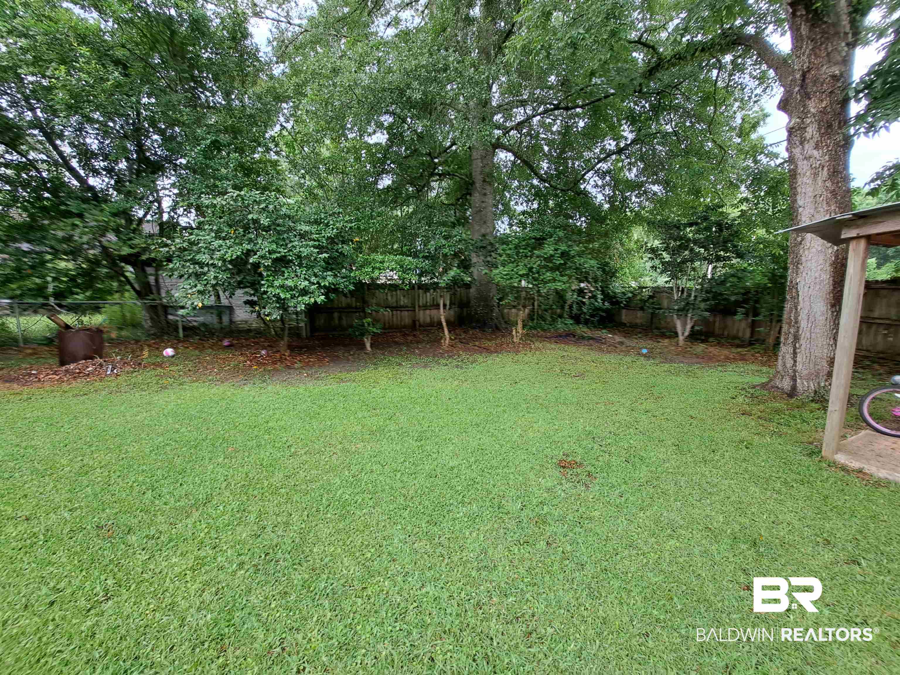 309 Bellview Avenue Evergreen, AL 36401 - Photo 3 of 27 View of fenced backyard