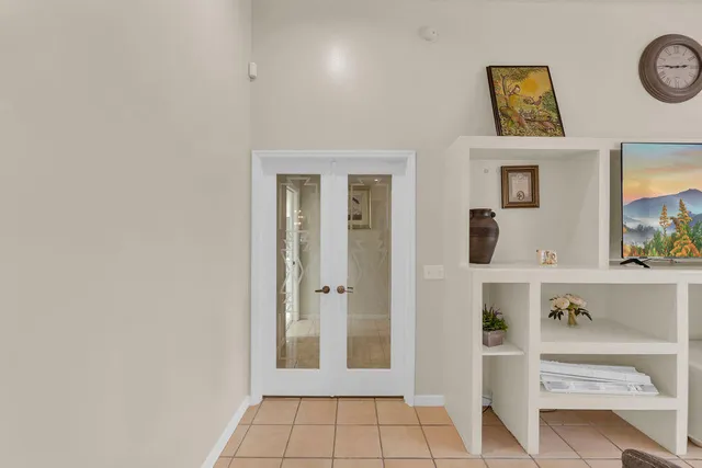 a spacious bathroom with a bathtub sink and mirror
