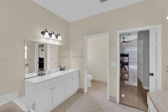 a view of a hallway with a dining area with a hallway