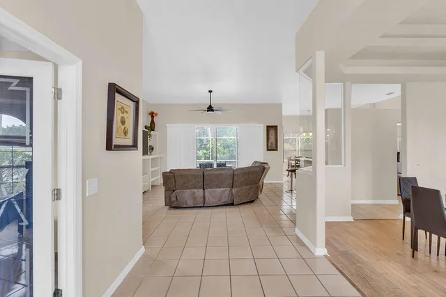 a living room with furniture and a rug