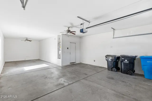 a view of swimming pool with seating space