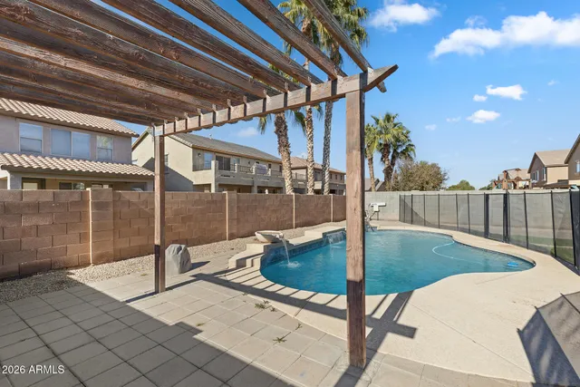 a view of a house with swimming pool