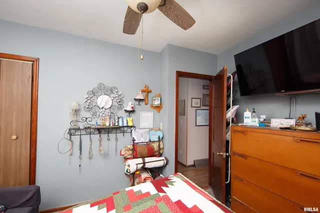 a kitchen with stainless steel appliances a stove refrigerator and microwave