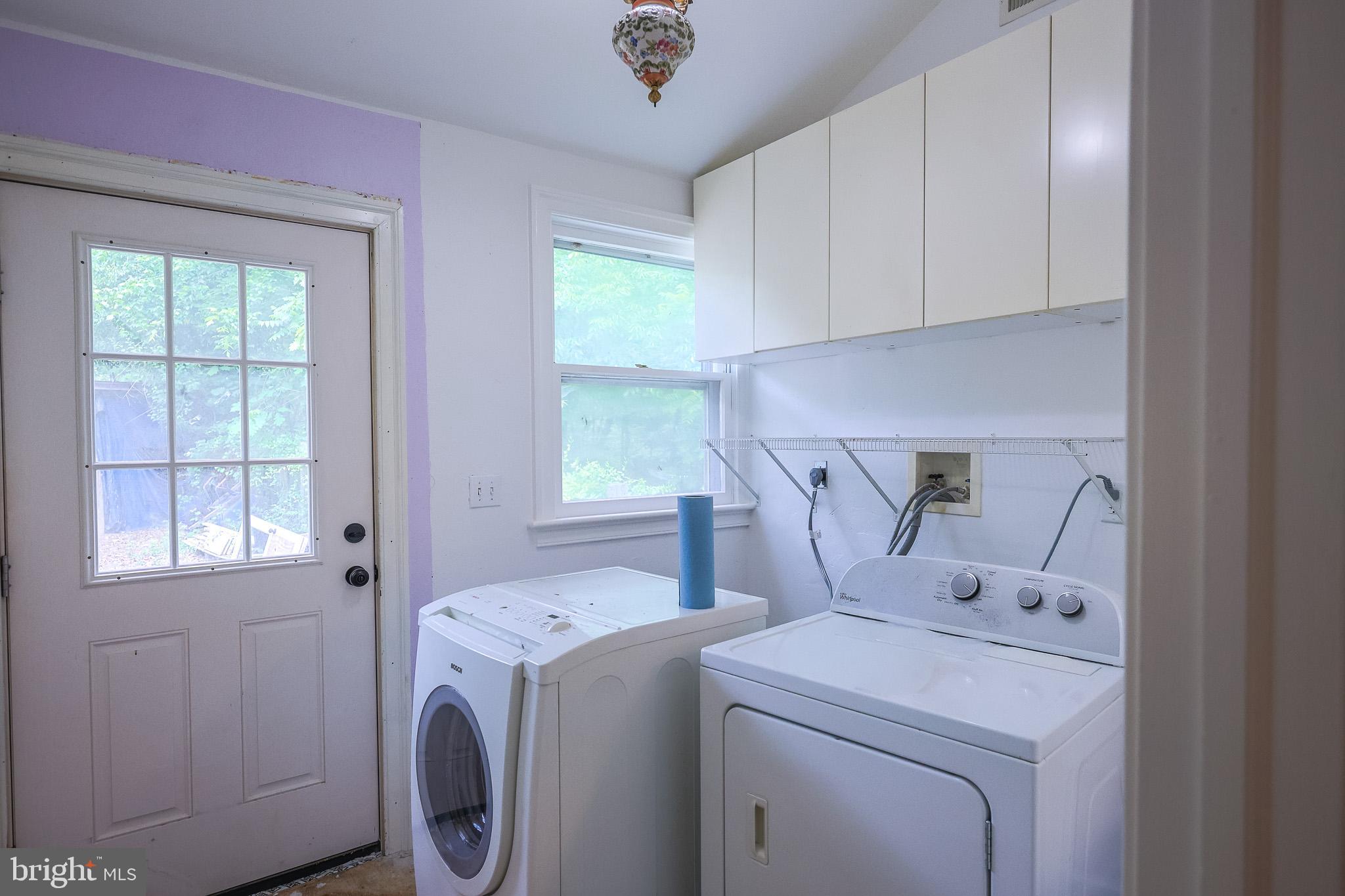 98 Swindler Hollow Road Sperryville, VA 22740 - Photo 18 of 25 a utility room with dryer and washer