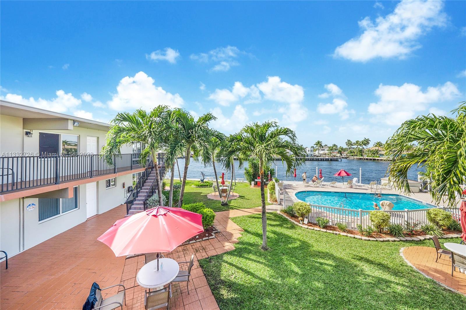 555 North Riverside Drive, Unit 15 Pompano Beach, FL 33062 - Photo 15 of 18 swimming pool with outdoor seating
