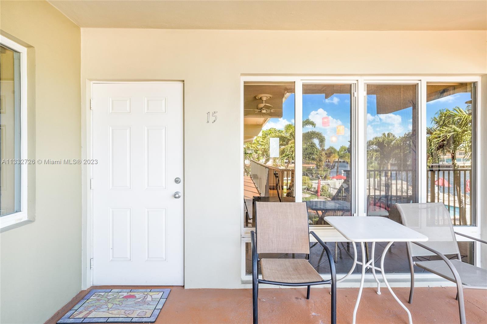 555 North Riverside Drive, Unit 15 Pompano Beach, FL 33062 - Photo 16 of 18 a view of a livingroom with furniture window and outside view