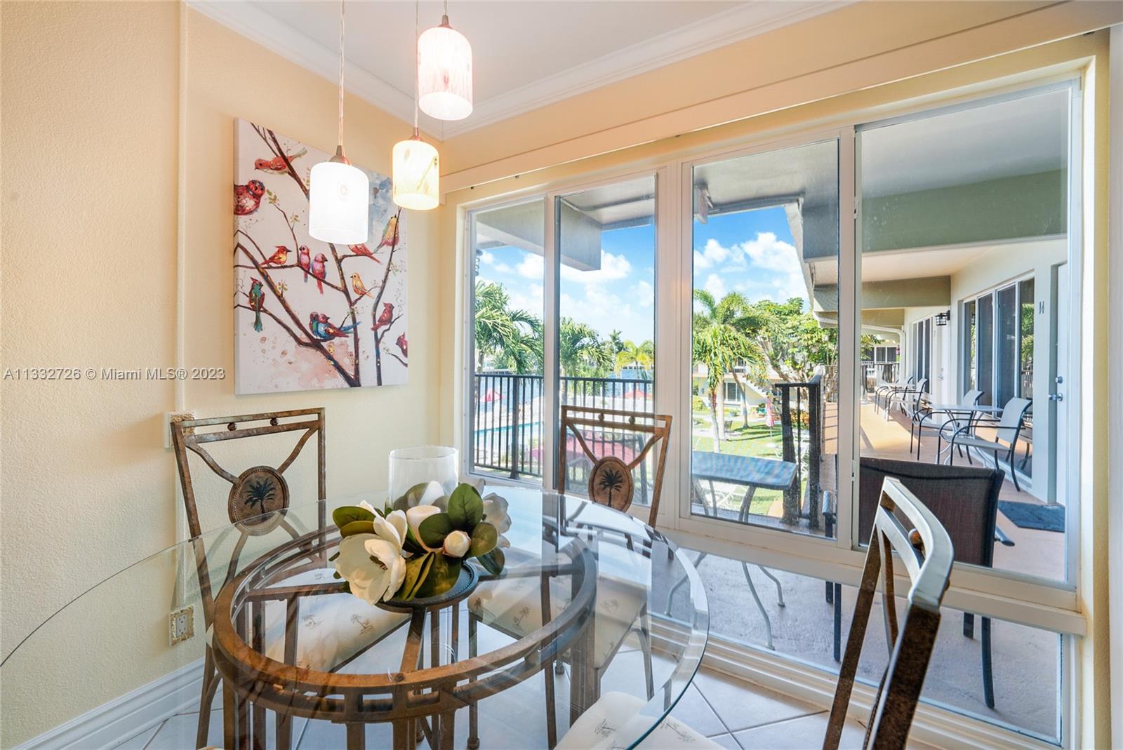 555 North Riverside Drive, Unit 15 Pompano Beach, FL 33062 - Photo 3 of 18 a view of a dining room with furniture window and outside view