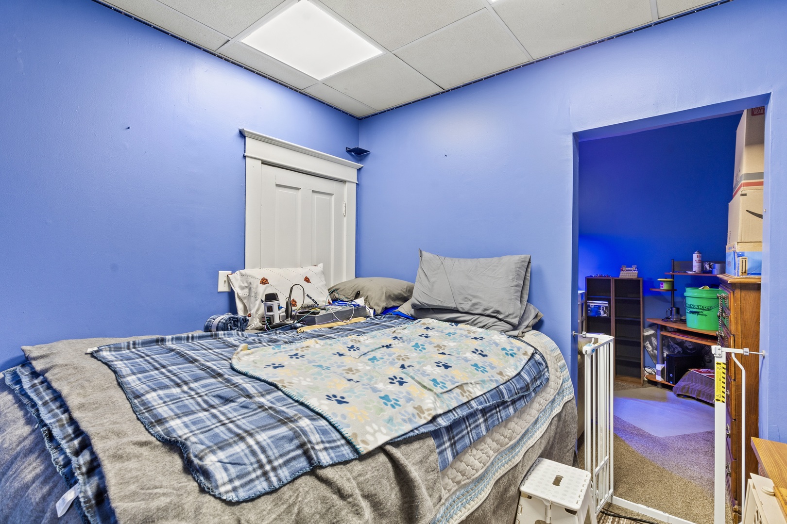 945 West Stone Street Kankakee, IL 60901 - Photo 15 of 28 a bedroom that has a bed and a table in it