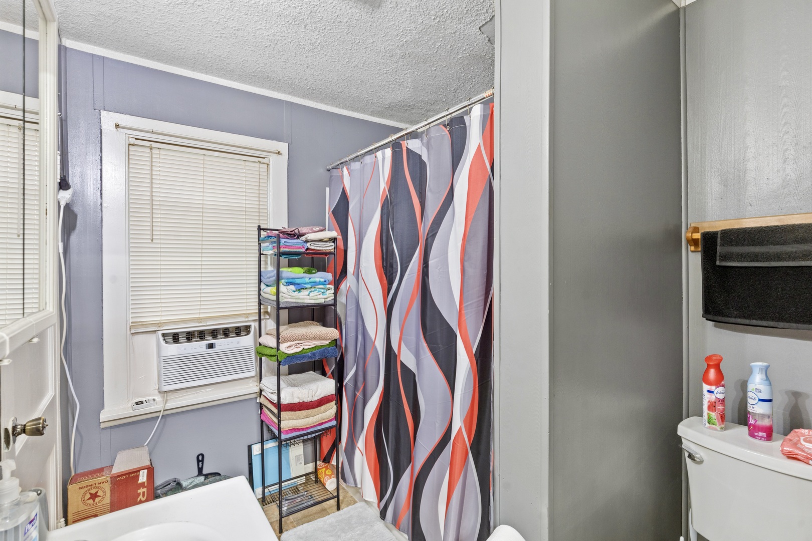 945 West Stone Street Kankakee, IL 60901 - Photo 16 of 28 a hallway with painting on the wall and a window