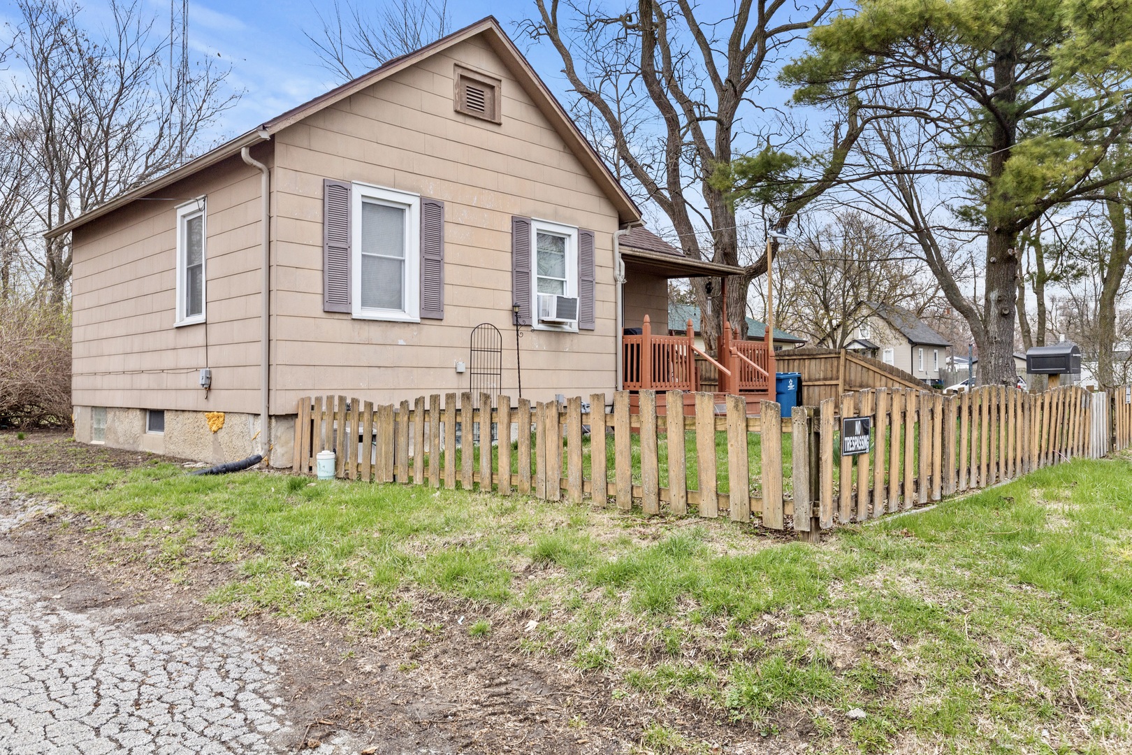 945 West Stone Street Kankakee, IL 60901 - Photo 19 of 28 a front view of a house with a yard