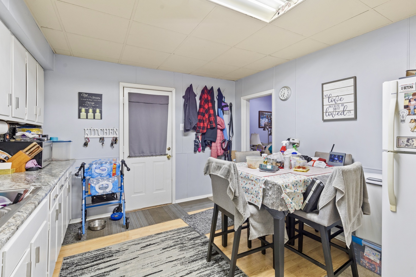 945 West Stone Street Kankakee, IL 60901 - Photo 7 of 28 a view of a dining room with furniture and wooden floor