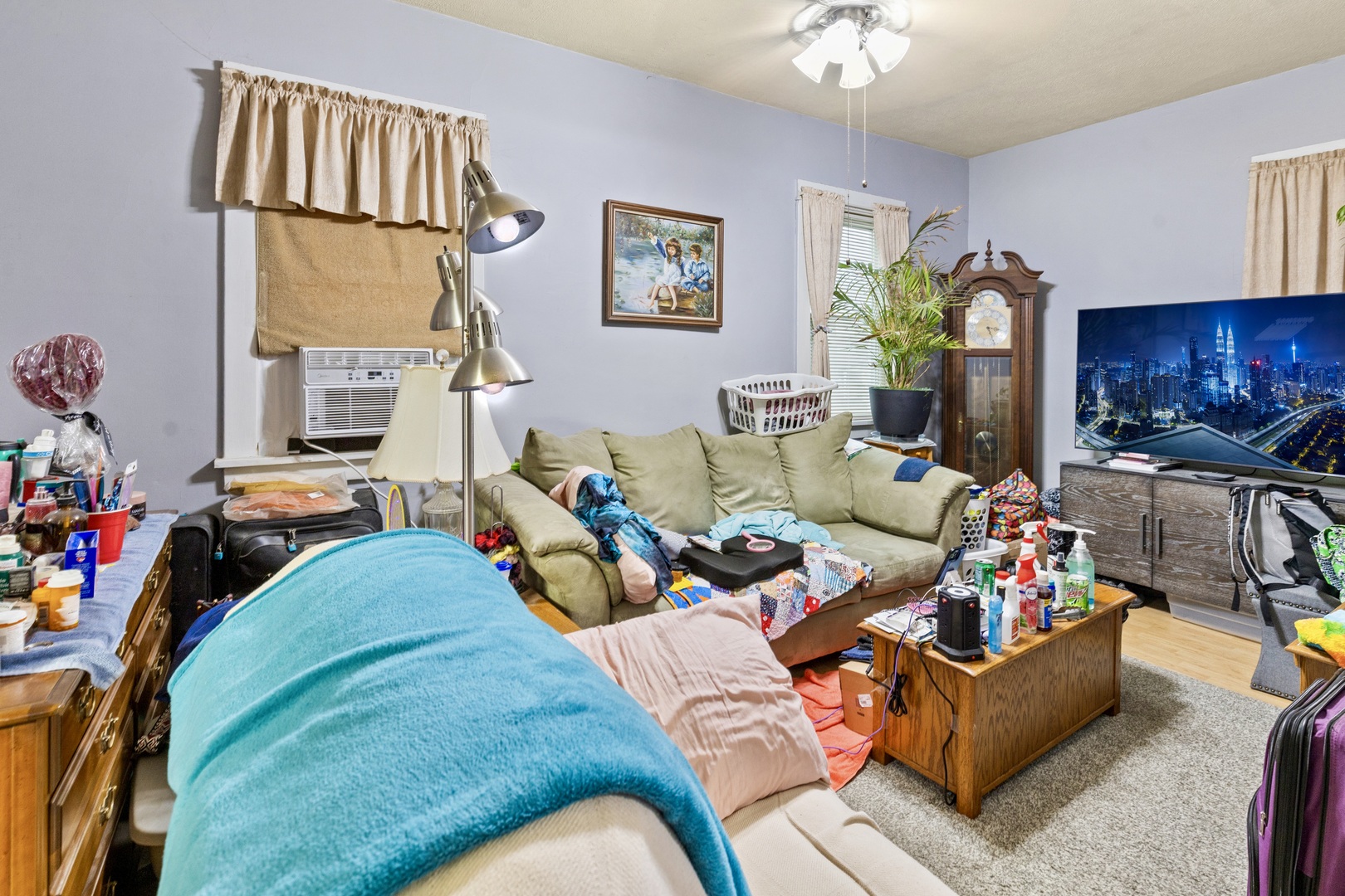 945 West Stone Street Kankakee, IL 60901 - Photo 9 of 28 a living room with furniture fireplace and a window