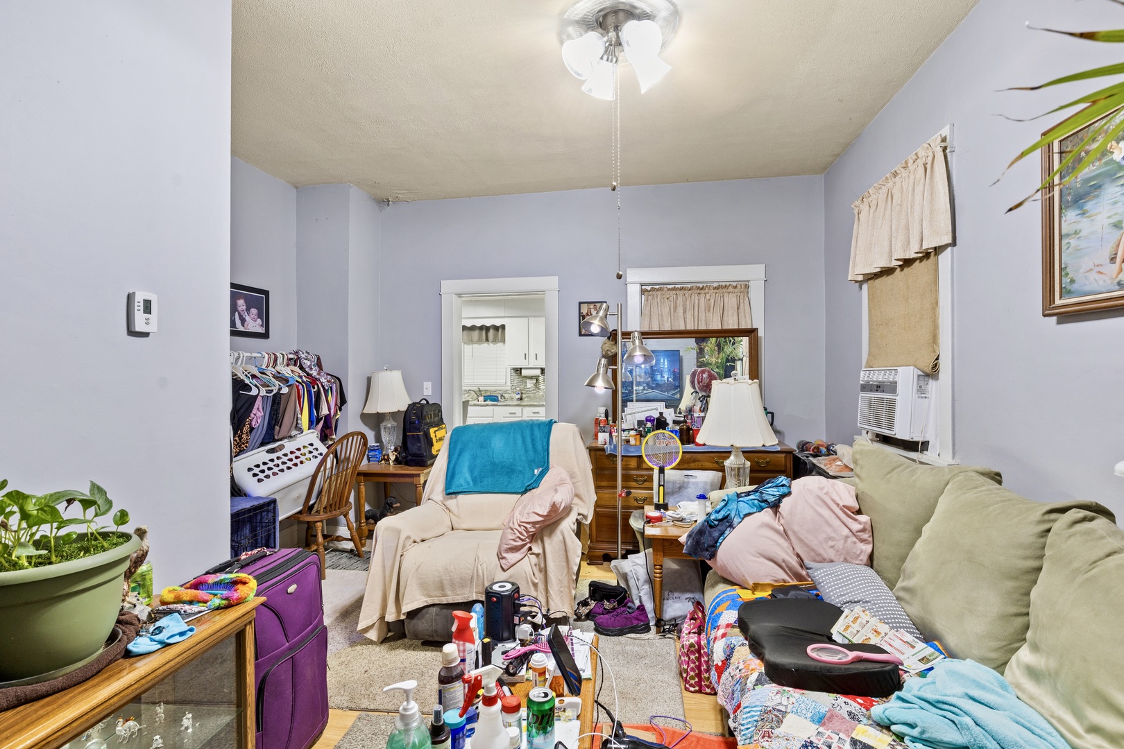945 West Stone Street Kankakee, IL 60901 - Photo 10 of 28 a bed room with furniture and a window