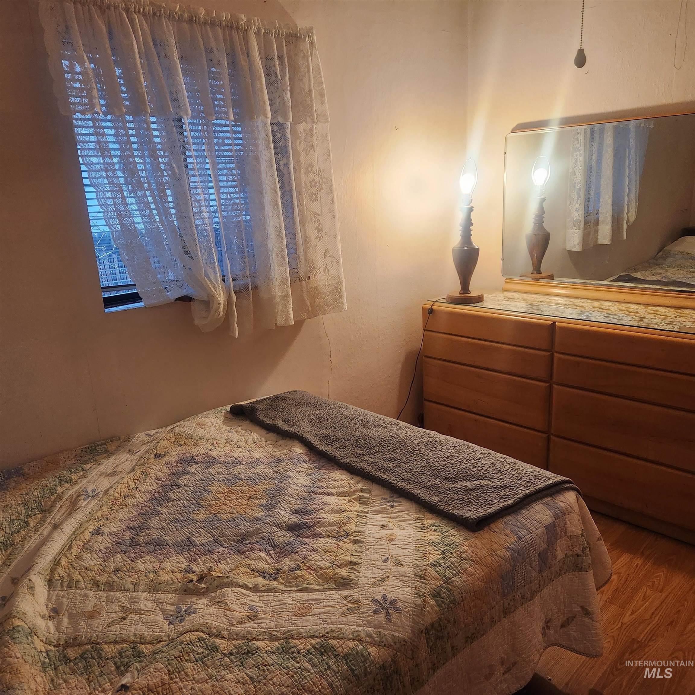 530 California Street Gooding, ID 83330 - Photo 11 of 30 Bedroom featuring wood finished floors