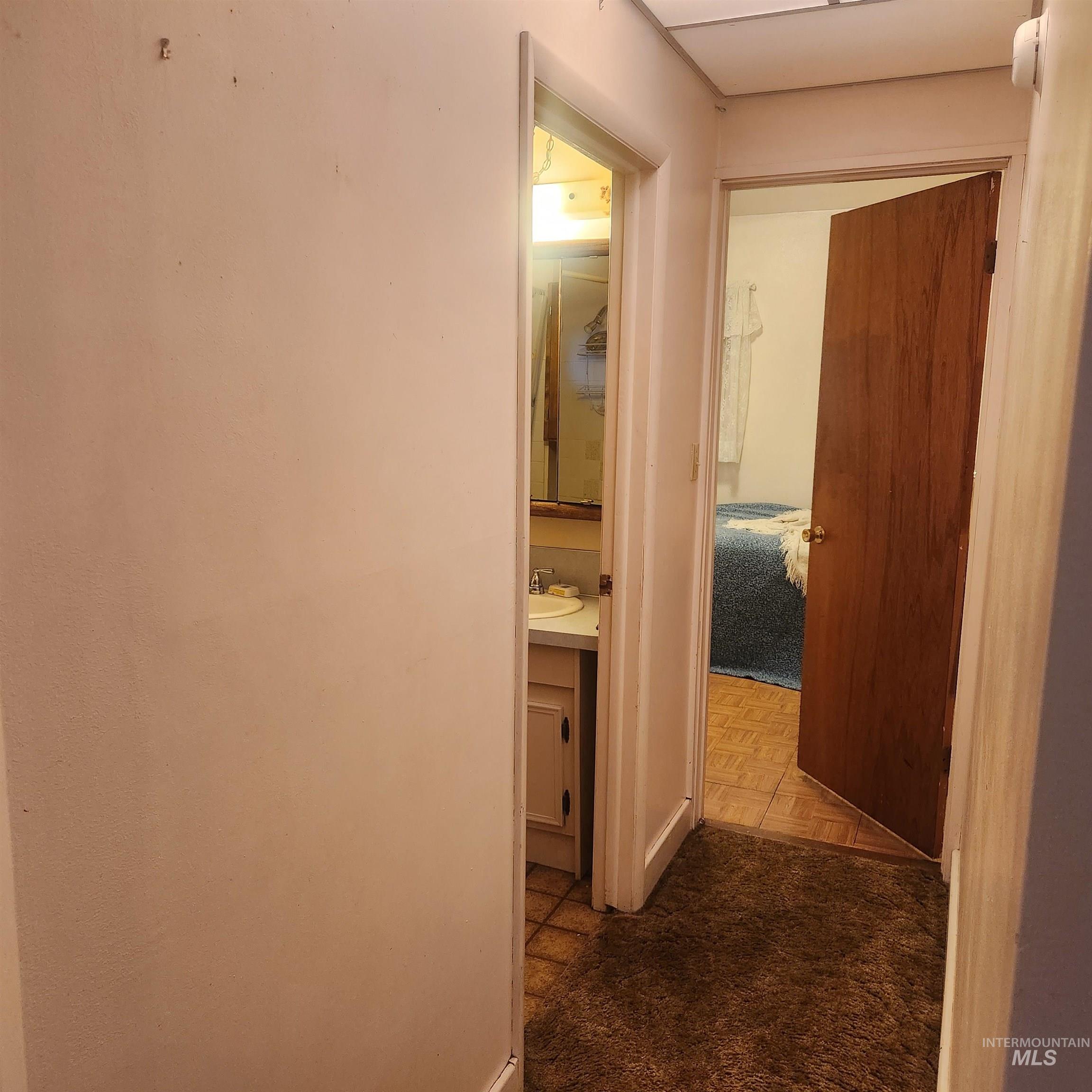 530 California Street Gooding, ID 83330 - Photo 14 of 30 Corridor featuring parquet flooring and a sink