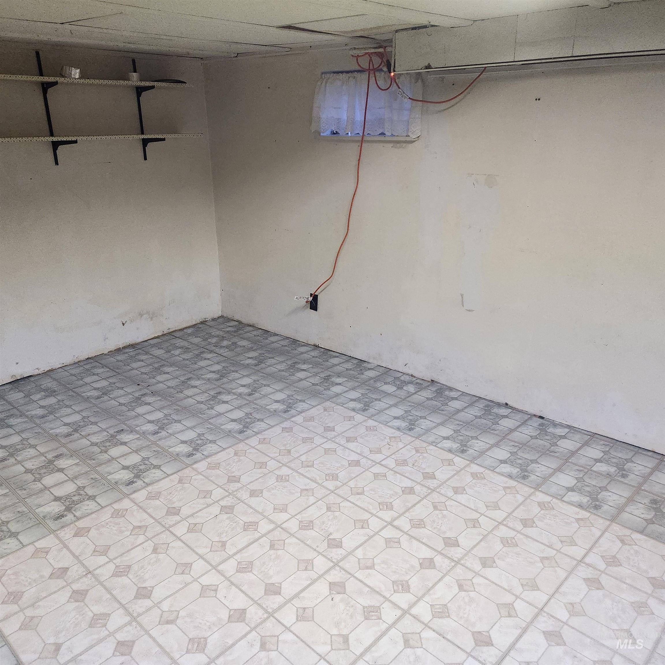 530 California Street Gooding, ID 83330 - Photo 21 of 30 Unfinished basement with tile patterned floors