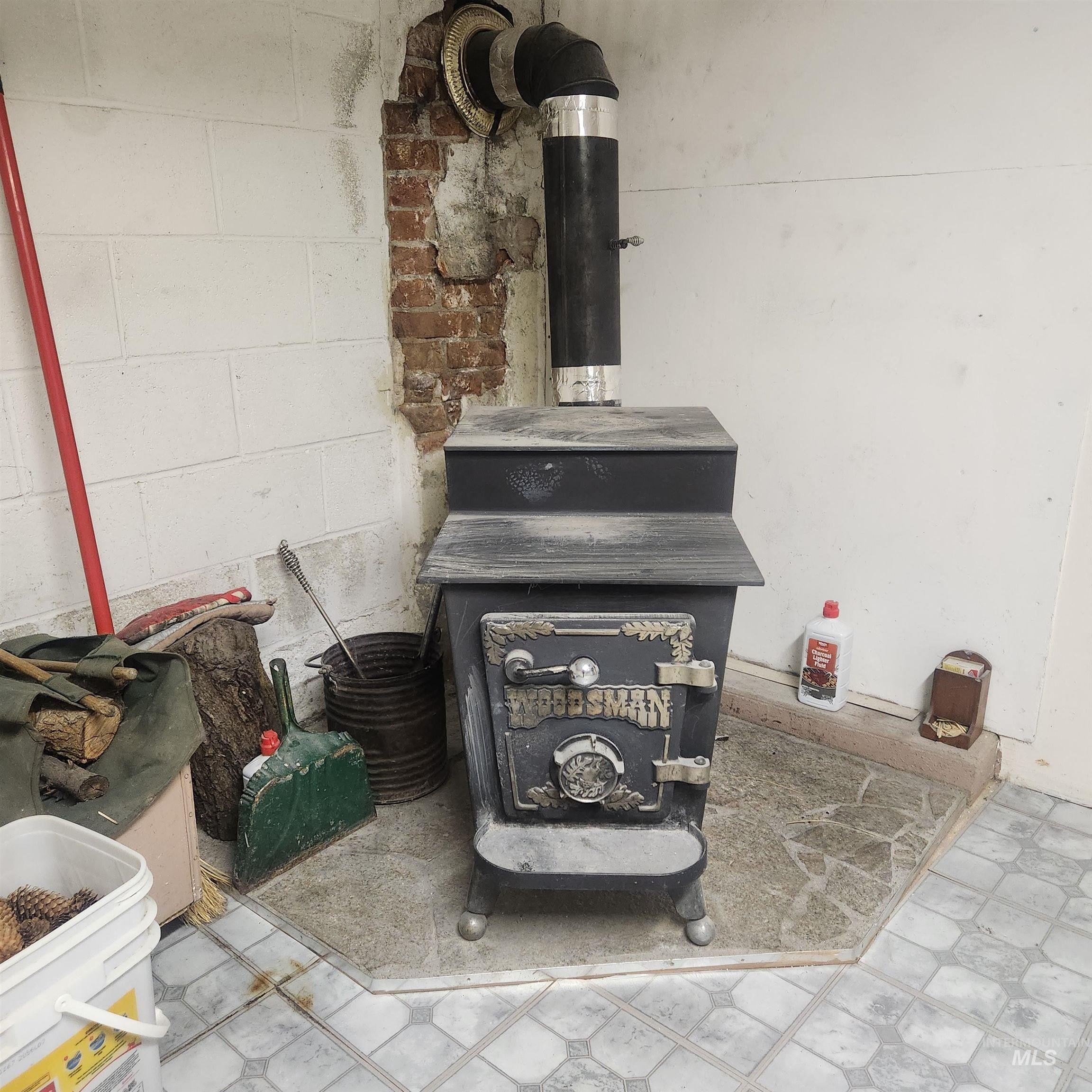 530 California Street Gooding, ID 83330 - Photo 23 of 30 Detailed view of the wood stove in the basement.
