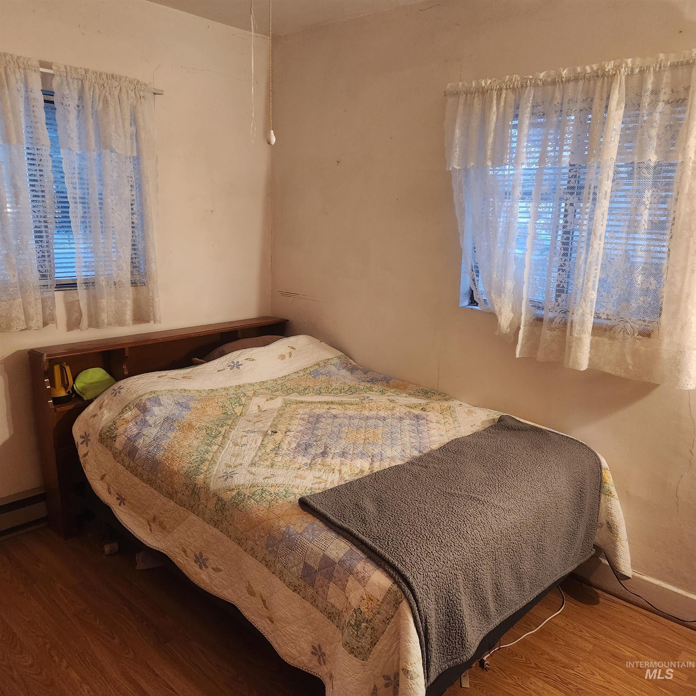 530 California Street Gooding, ID 83330 - Photo 10 of 30 Bedroom featuring wood finished floors