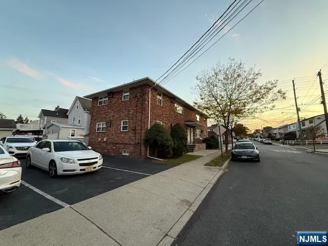a car parked in front of a house