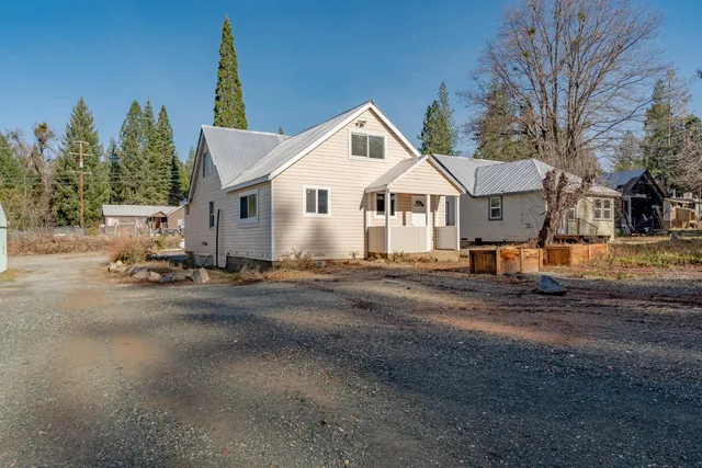 a view of a house with a street