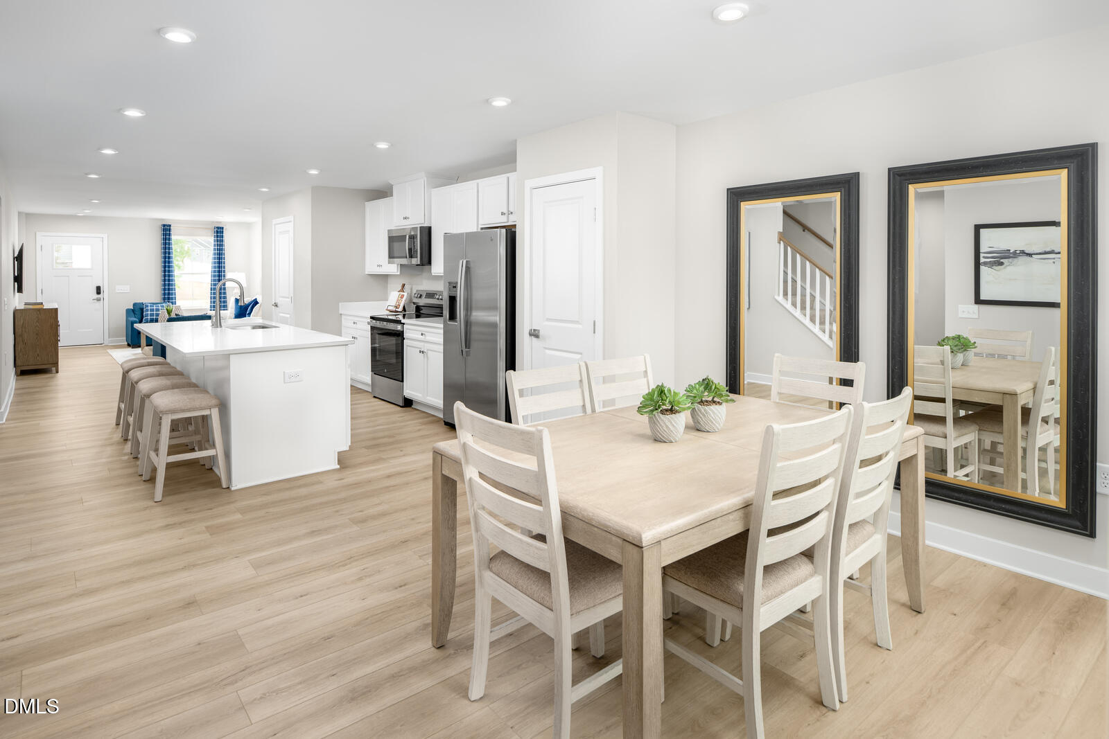 1309 Rollman Farm Road Raleigh, NC 27603 - Photo 6 of 22 a view of a dining room with furniture and wooden floor