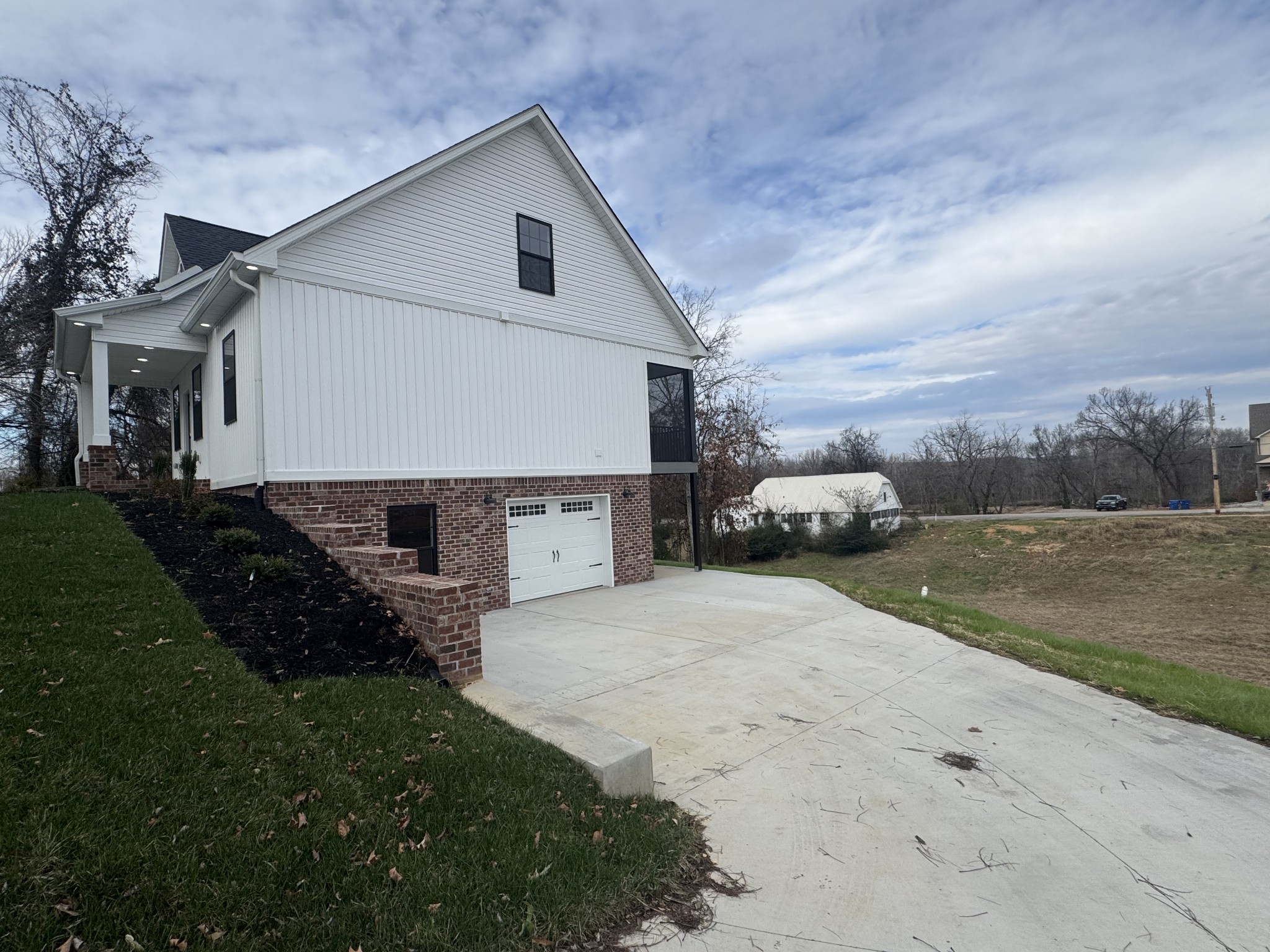 200 Hood Street Dover, TN 37058 - Photo 23 of 27 a house view with a garden space
