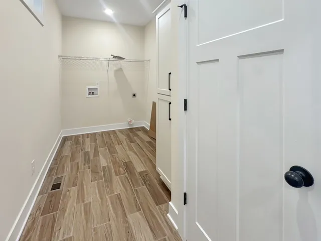 a bathroom with a shower and a shower