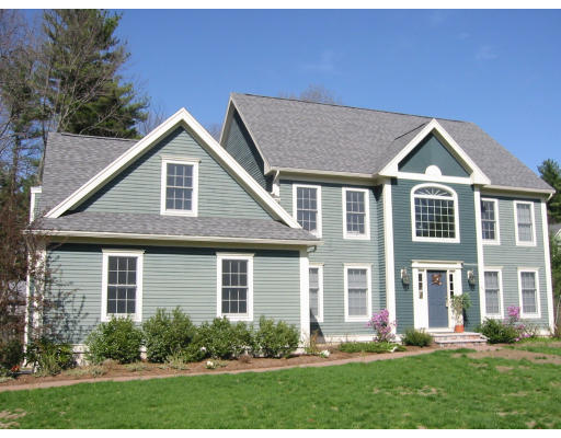 104 Maynard Road Sudbury, MA 01776 - Photo 1 of 1 a front view of a house with a yard