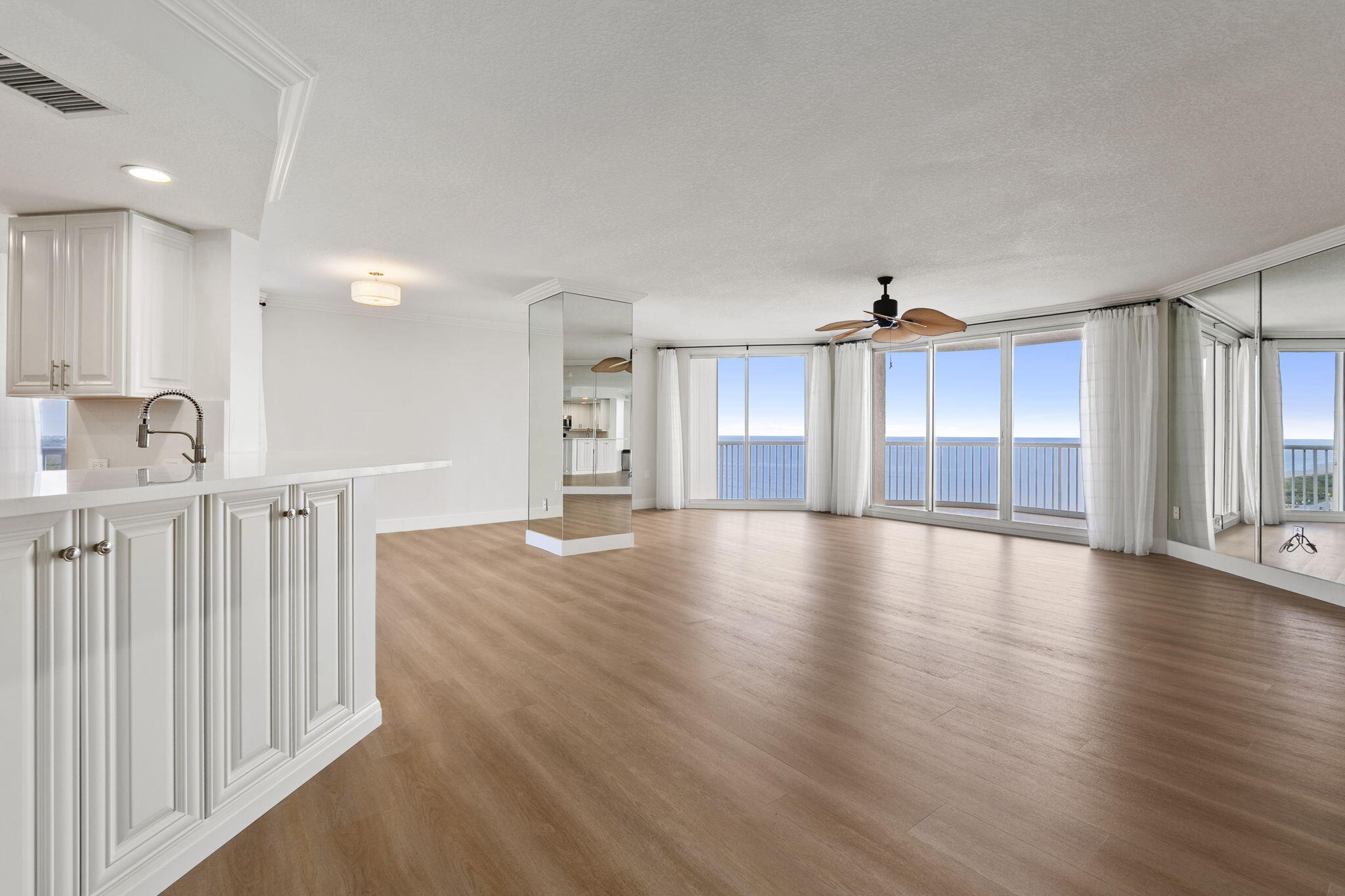 5051 North Hwy A1A, Unit PH24 Fort Pierce, FL 34949 - Photo 11 of 50 wooden floor in an empty room with a window