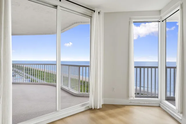 a kitchen with wooden cabinets and stainless steel appliances