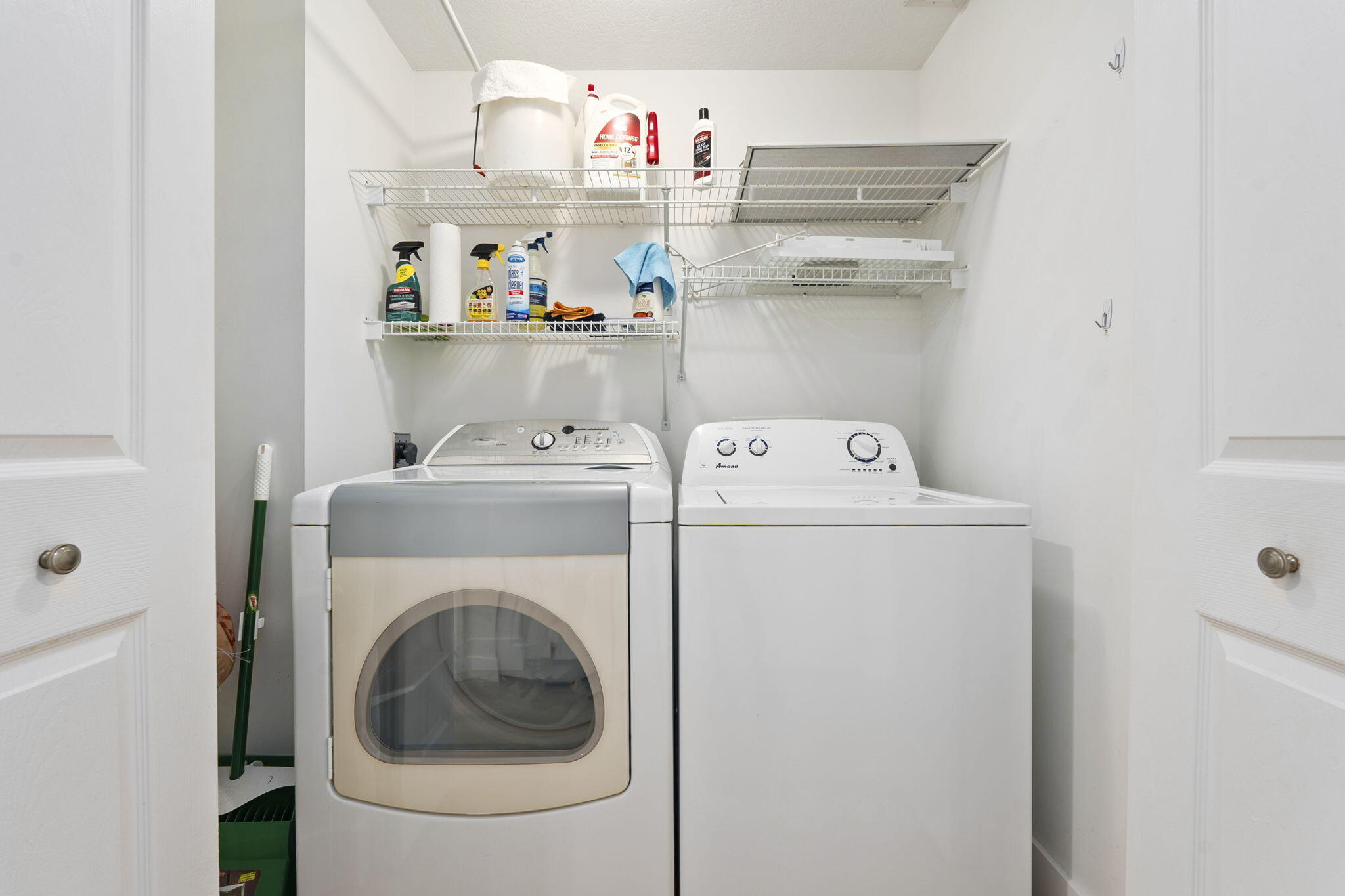 5051 North Hwy A1A, Unit PH24 Fort Pierce, FL 34949 - Photo 32 of 50 a utility room with dryer and washer