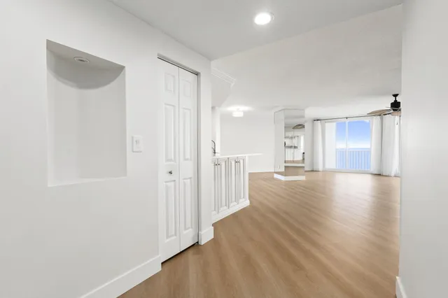a bathroom with a shower sink and mirror