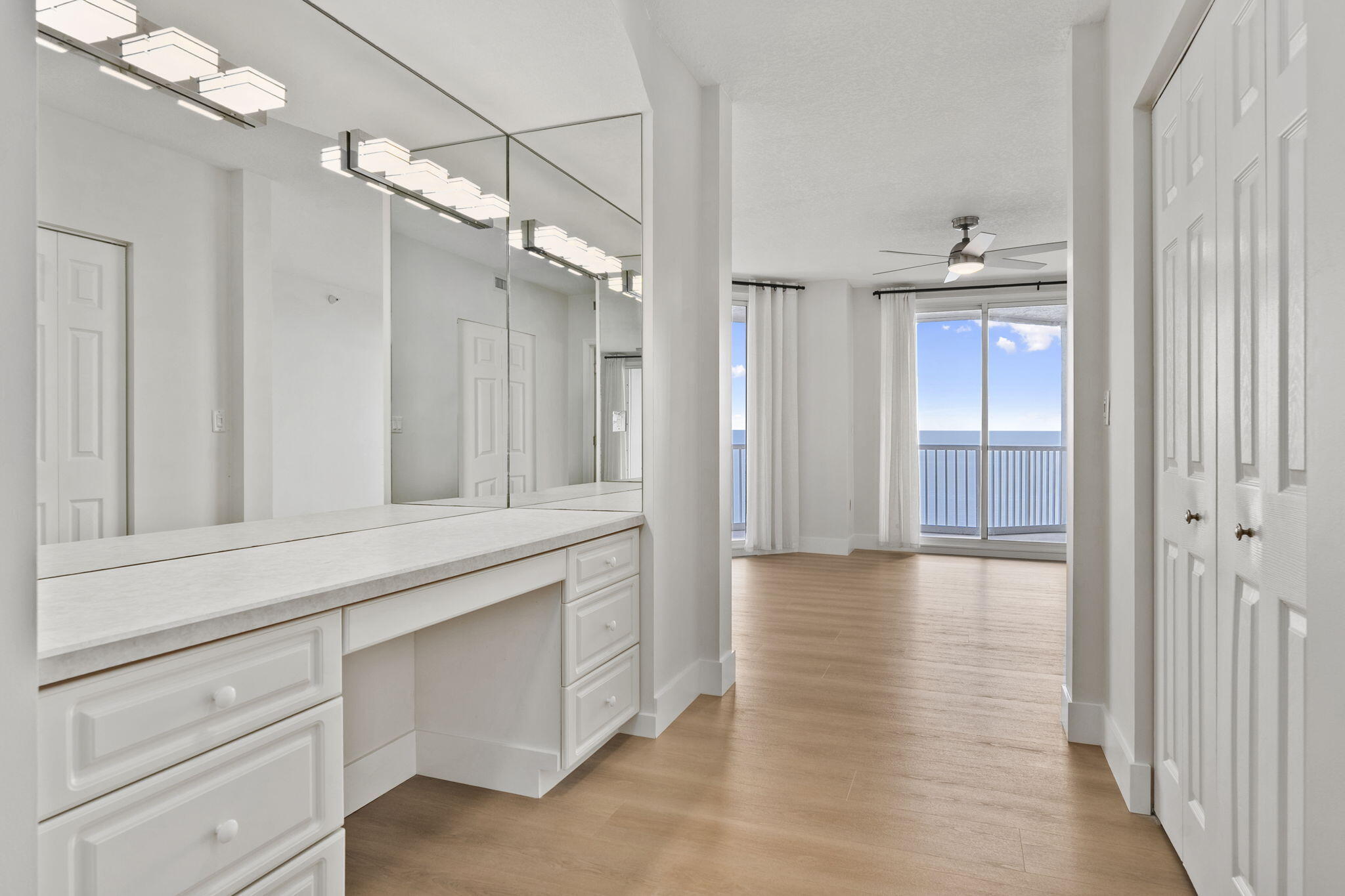5051 North Hwy A1A, Unit PH24 Fort Pierce, FL 34949 - Photo 46 of 50 a view of a bathroom with mirror and shower