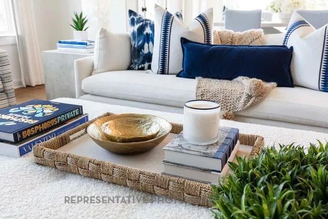 a living room with furniture and decor