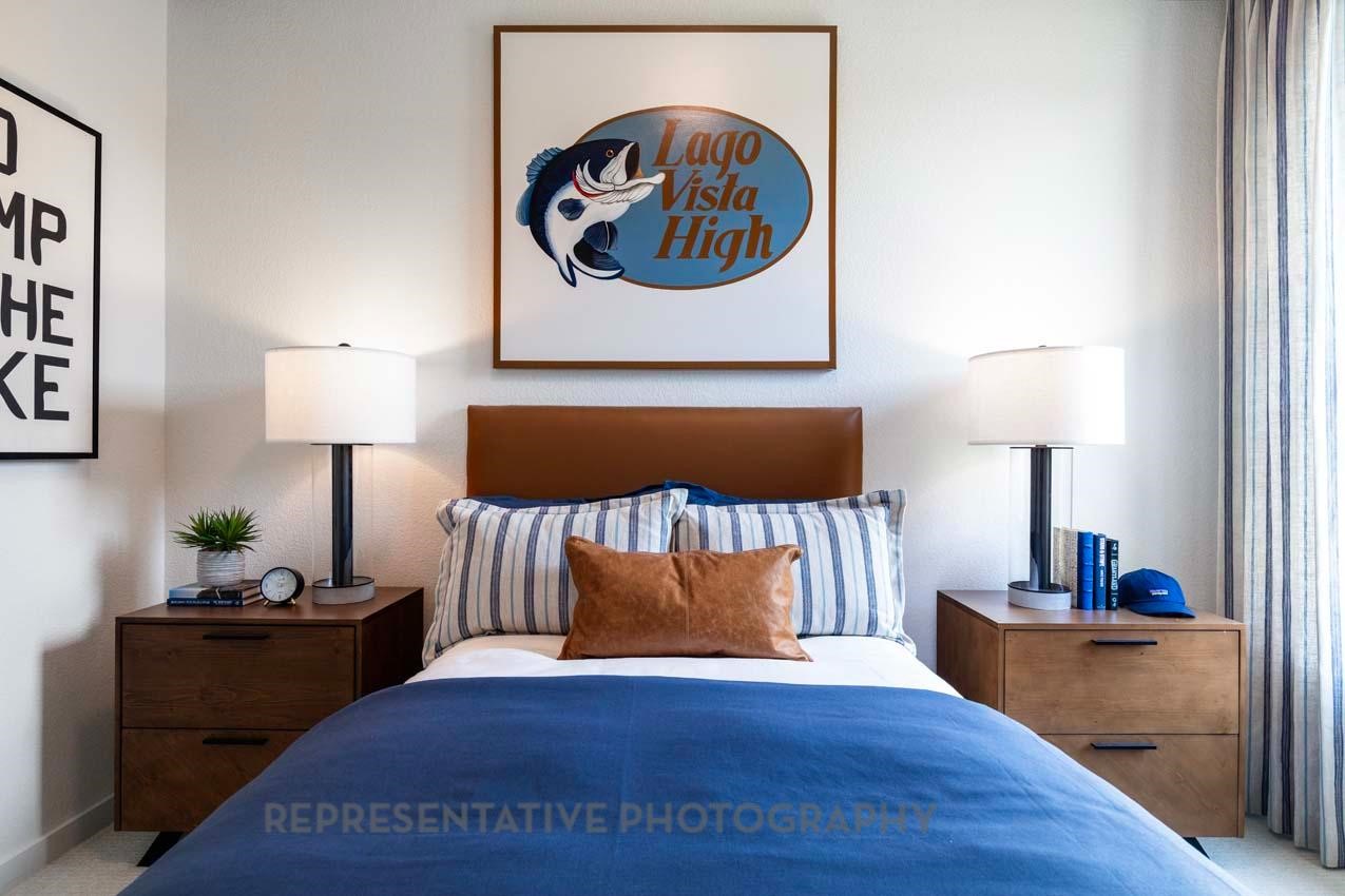 22218 Mount Whitney Road Waller, TX 77484 - Photo 43 of 49 a bedroom with a bed and a lamp