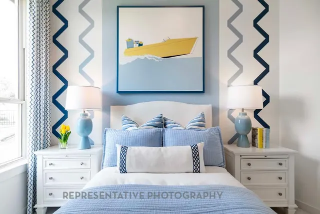 a bedroom with a bed and a dresser