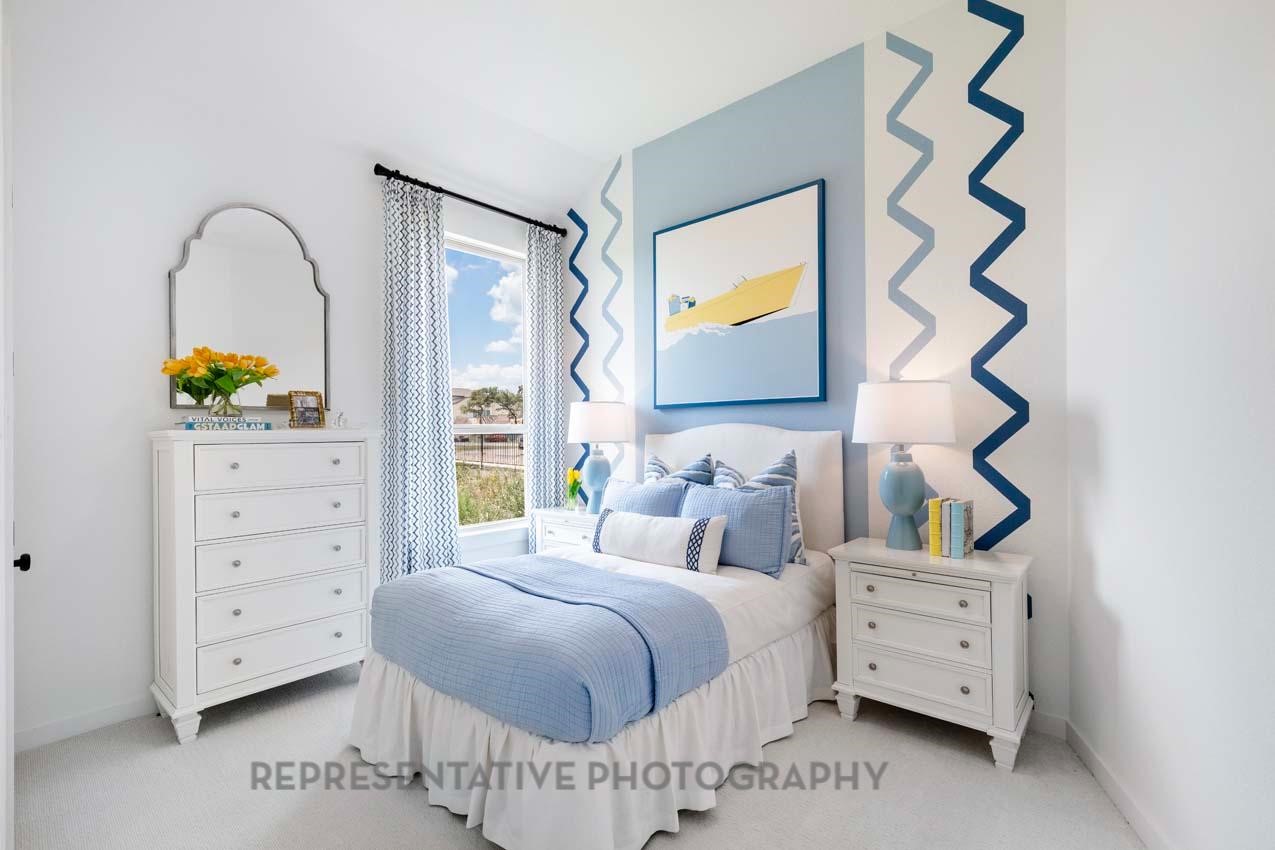 22218 Mount Whitney Road Waller, TX 77484 - Photo 45 of 49 a bedroom with a bed and a dresser