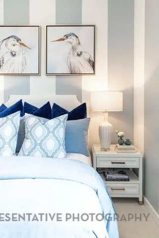a large kitchen with a table and chairs