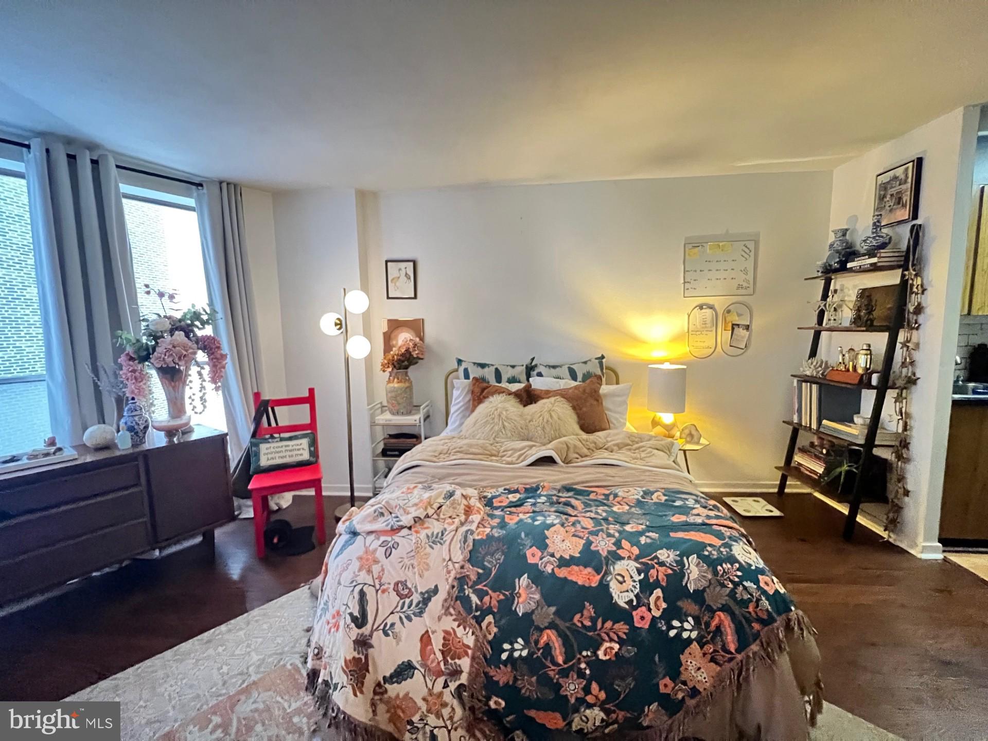 224 West Rittenhouse Square, Unit 1202 Philadelphia, PA 19103 - Photo 7 of 17 a bedroom with bed and a window