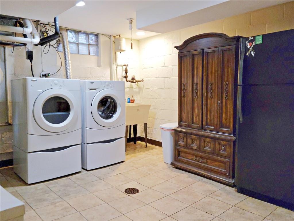 5184 Richland Road Gibsonia, PA 15044 - Photo 19 of 23 a utility room with dryer and washer