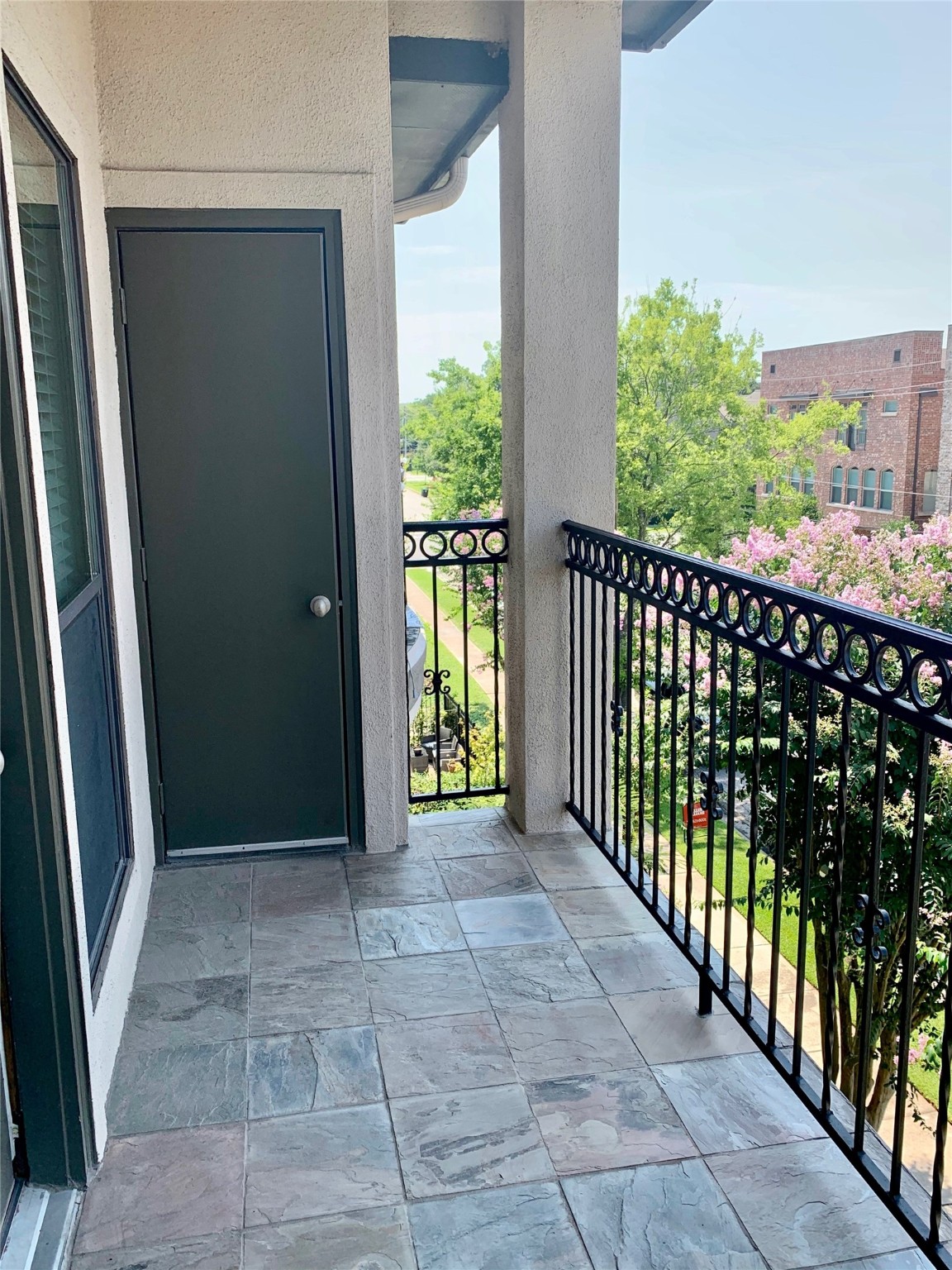 1403 Rosedale Street Houston, TX 77004 - Photo 14 of 18 a view of a balcony with wooden floor