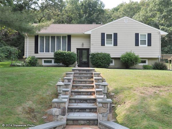 127 Fish Road Tiverton, RI 02878 - Photo 13 of 30 a front view of a house with a yard