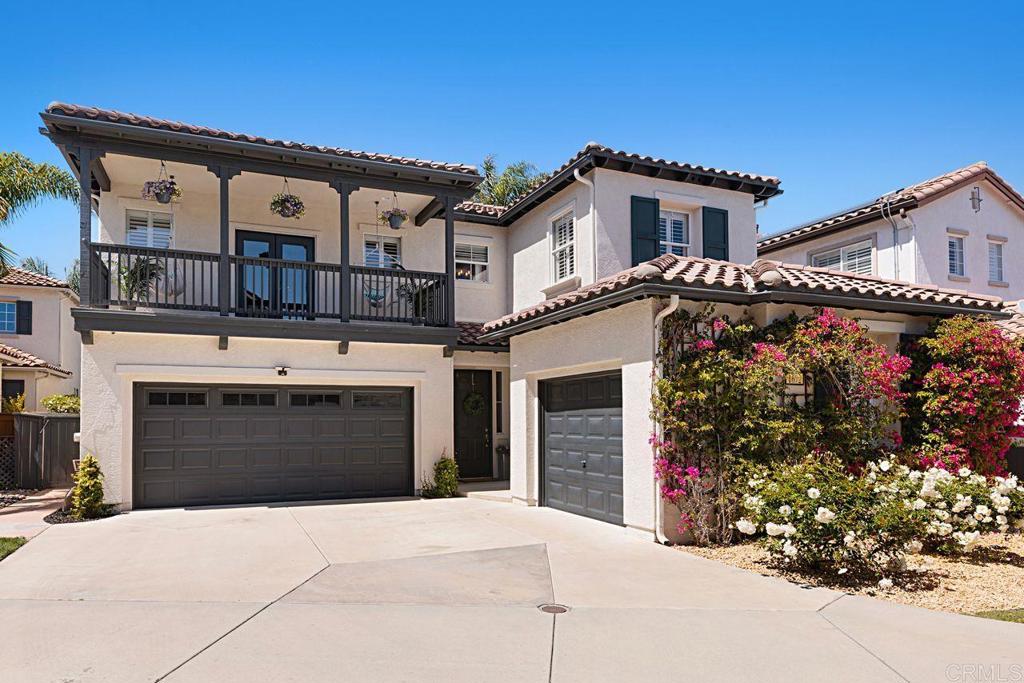 1672 Sagewood Way San Marcos, CA 92078 - Photo 1 of 61 a front view of a house with a yard and garage