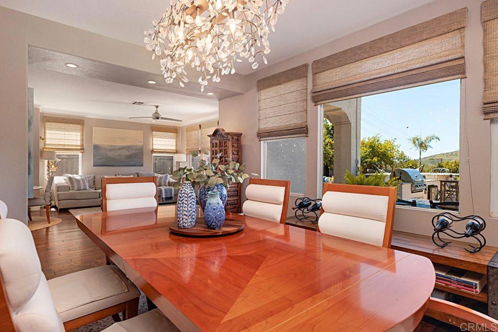 1672 Sagewood Way San Marcos, CA 92078 - Photo 15 of 61 a living room with fireplace furniture and a large window