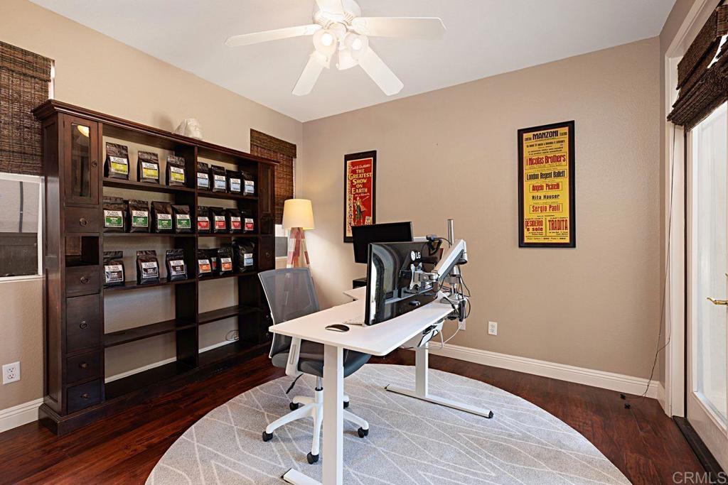 1672 Sagewood Way San Marcos, CA 92078 - Photo 22 of 61 a view of a workspace with furniture and wooden floor