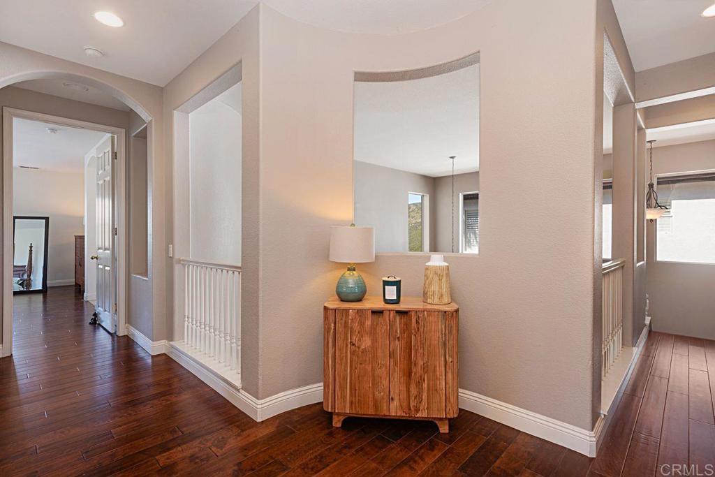 1672 Sagewood Way San Marcos, CA 92078 - Photo 26 of 61 a view of a room with wooden floor and cabinet