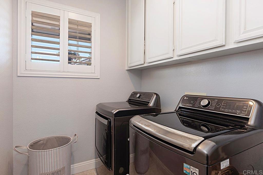 1672 Sagewood Way San Marcos, CA 92078 - Photo 39 of 61 a utility room with dryer and washer