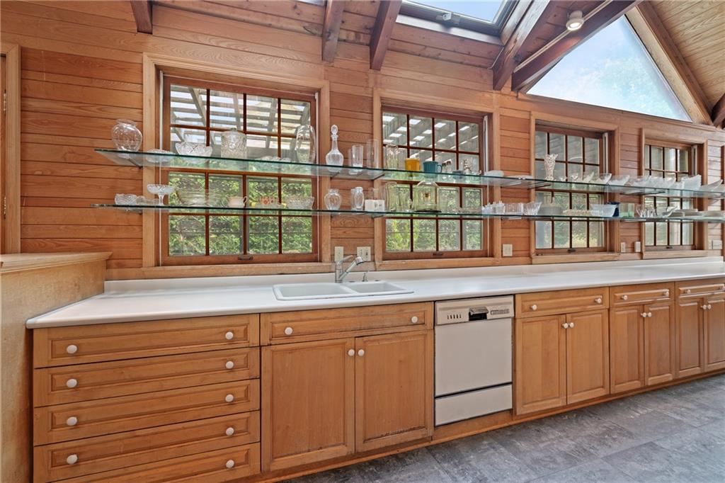 5238 Ellsworth Avenue Pittsburgh, PA 15232 - Photo 11 of 47 a kitchen with cabinets and window