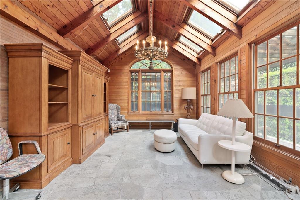5238 Ellsworth Avenue Pittsburgh, PA 15232 - Photo 13 of 47 a living room with furniture and a large window