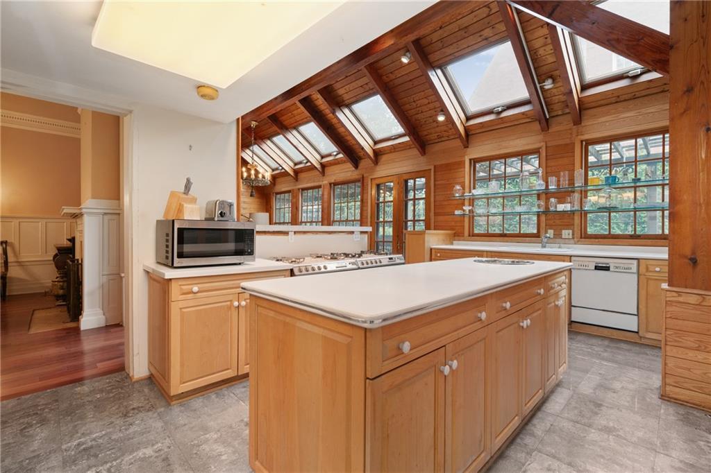 5238 Ellsworth Avenue Pittsburgh, PA 15232 - Photo 15 of 47 a kitchen with stainless steel appliances granite countertop a stove and a sink